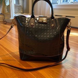 Arcadia grey patent,black leather tote. Carry handles/shoulder strap. Turn lock.